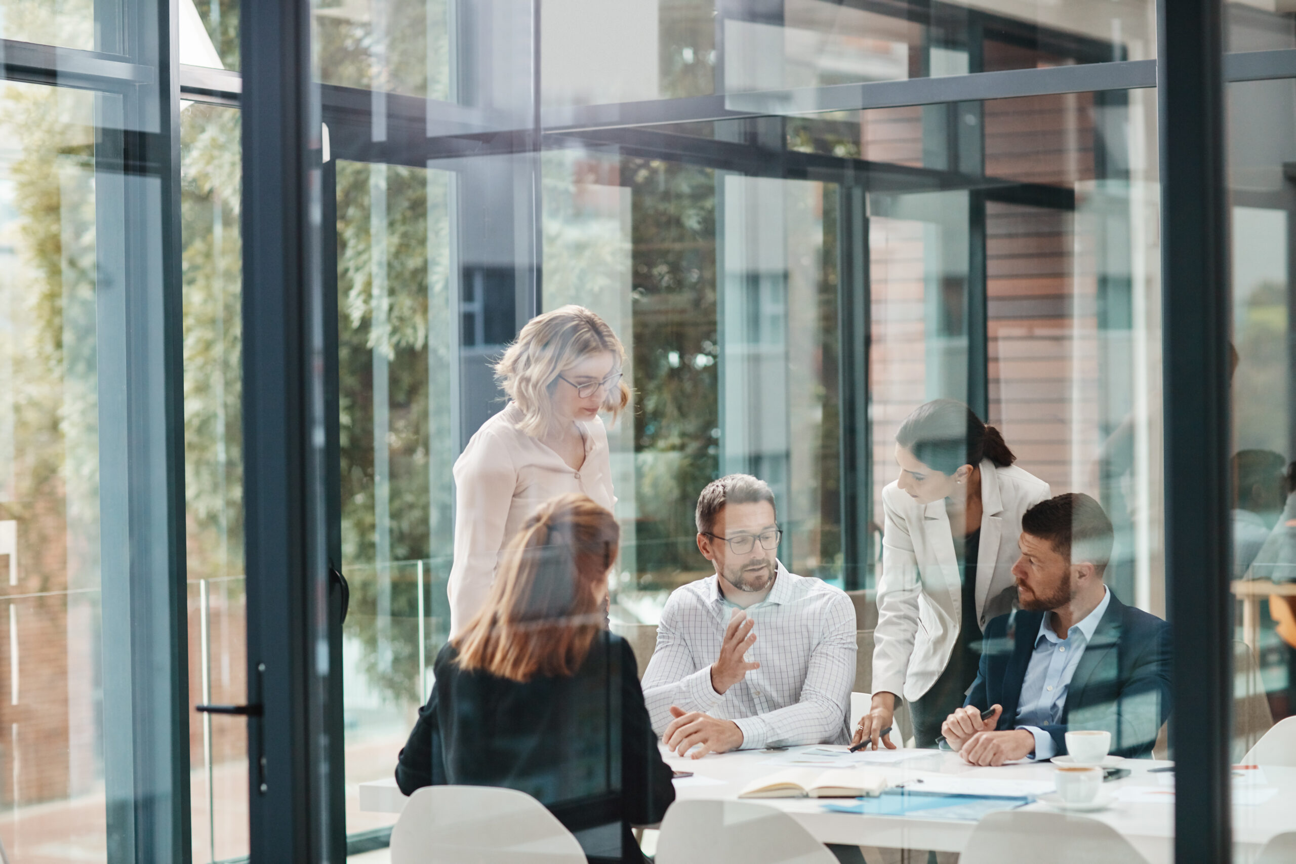 Window, Business People Or Planning In Meeting For Paperwork, Teamwork Or Collaboration Together. Shareholders, Investor Or Executive Director Speaking In Discussion For Feedback, Review Or Project